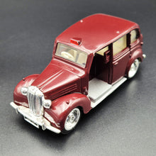Load image into Gallery viewer, ERTL 1958 London Taxi-Austin FX3 3 Door Taxi Cab Maroon #2551 1:43 ERTL Vintage Vehicles Diecast Model