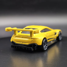 Load image into Gallery viewer, Hot Wheels 2024 Aston Martin Vantage GTE Yellow HW Motor Show 5 Pack Exclusive