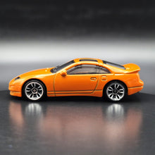 Load image into Gallery viewer, Hot Wheels 2024 Nissan 300ZX Twin Turbo Orange Nightburnerz 5 Pack Exclusive