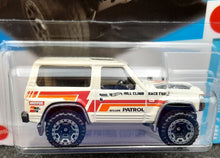 Load image into Gallery viewer, Hot Wheels 2023 Nissan Patrol Custom Ivory #20 HW J-Imports 1/10 New Long Card