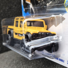 Load image into Gallery viewer, Hot Wheels 2025 '15 Land Rover Defender Double Cab Yellow #179 HW Dirt 10/10 New Long Card
