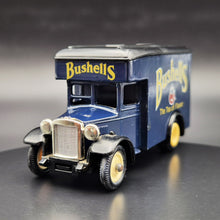 Load image into Gallery viewer, Lledo Days Gone 1934 Dennis Parcels Van "Bushells" "The Tea of Flavor" DG16007