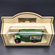 Load image into Gallery viewer, Lledo Days Gone 1934 Dennis Parcels Van Carter Paterson - Atora for Xmas DG16027