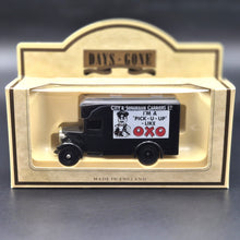 Load image into Gallery viewer, Lledo Days Gone 1934 Dennis Parcels Van City &amp; Suburban Carriers Ltd OXO Dark Blue DG16023