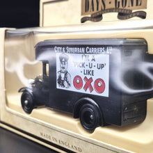 Load image into Gallery viewer, Lledo Days Gone 1934 Dennis Parcels Van City &amp; Suburban Carriers Ltd OXO Dark Blue DG16023