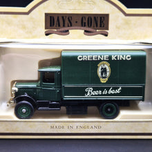Load image into Gallery viewer, Lledo Days Gone 1934 Mack Canvas Backed Truck Greene King Ales Dark Green DG28010