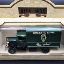 Load image into Gallery viewer, Lledo Days Gone 1934 Mack Canvas Backed Truck Greene King Ales Dark Green DG28010