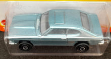 Load image into Gallery viewer, Matchbox 2022 1970 Ford Capri Light Blue #41 MBX Showroom New Long Card