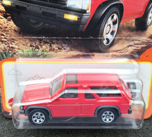 Load image into Gallery viewer, Matchbox 2024 1985 Nissan Pathfinder Red #54 MBX Adventure New Long Card