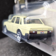 Load image into Gallery viewer, Matchbox 2025 1986 Volvo 240 Cream Yellow #122 MBX Showroom New Long Card