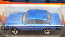 Load image into Gallery viewer, Matchbox 2023 1986 Volvo 240 Light Blue #99 MBX Showroom New Long Card