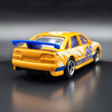 Load image into Gallery viewer, Matchbox 1998 Holden Commodore Orange #64 Matchbox 1-75 Series