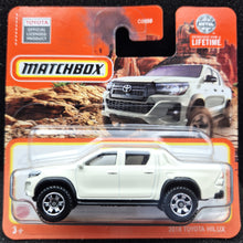 Load image into Gallery viewer, Matchbox 2023 2018 Toyota Hilux White #94 MBX Off-Road New