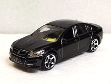 Load image into Gallery viewer, Matchbox 2025 Holden VF Commodore SSV Black #106 MBX Road Trip New Sealed Box