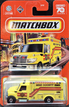 Load image into Gallery viewer, Matchbox 2023 International WorkStar Ambulance Yellow #38 MBX Metro Long Card