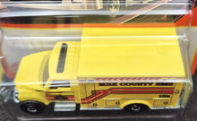 Load image into Gallery viewer, Matchbox 2023 International WorkStar Ambulance Yellow #38 MBX Metro Long Card