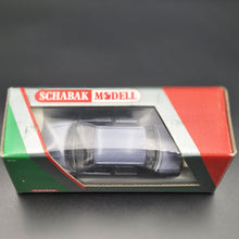 Load image into Gallery viewer, Schabak Modell 1987 Ford Sierra 2.0i Ghia Blue/Grey #1080 1:43 Die Cast Model