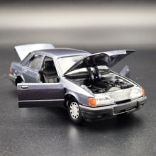 Load image into Gallery viewer, Schabak Modell 1987 Ford Sierra 2.0i Ghia Blue/Grey #1080 1:43 Die Cast Model