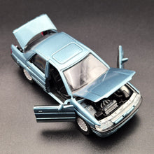 Load image into Gallery viewer, Schabak Modell 1993 Ford Orion (Escort) Light Blue #1092 1-43 Die Cast Model