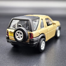 Load image into Gallery viewer, Smart Toys 2003 Land Rover Freelander Gold 1:52 Diecast Car