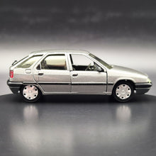 Load image into Gallery viewer, Solido 1991 Citroen ZX Aura Silver #1523 1:43 Today Series Die Cast Model