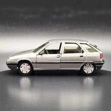 Load image into Gallery viewer, Solido 1991 Citroen ZX Aura Silver #1523 1:43 Today Series Die Cast Model