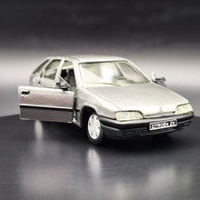 Load image into Gallery viewer, Solido 1991 Citroen ZX Aura Silver #1523 1:43 Today Series Die Cast Model