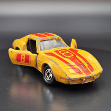 Load image into Gallery viewer, Tomica 1977 Chevrolet Corvette Stingray Dark Yellow #F21