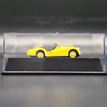 Load image into Gallery viewer, Universal Hobbies Eagle's Race 1955 Triumph TR2 Yellow #3683 1:43 Die Cast Model