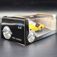 Load image into Gallery viewer, Universal Hobbies Eagle's Race 1955 Triumph TR2 Yellow #3683 1:43 Die Cast Model