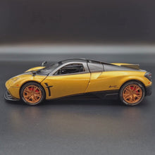 Load and play video in Gallery viewer, Explorafind 2018 Pagani Huayra Gold 1:24 Die Cast Car