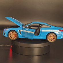 Load and play video in Gallery viewer, Explorafind 2023 BMW M8 Manhart MH8 800 Blue 1:24 Die Cast Car
