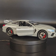 Load and play video in Gallery viewer, Explorafind 2023 BMW M8 Manhart MH8 800 Grey 1:24 Die Cast Car
