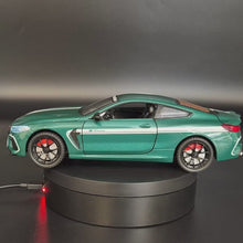 Load and play video in Gallery viewer, Explorafind 2023 BMW M8 Manhart MH8 800 Green 1:24 Die Cast Car