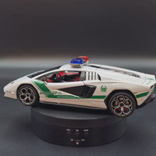 Load and play video in Gallery viewer, Explorafind 2023 Lamborghini Countach LPI 800-4 Dubai Police White 1:24 Die Cast Police Car
