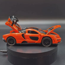 Load and play video in Gallery viewer, Explorafind 2019 McLaren Senna Orange 1:32 Die Cast Car