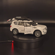 Load and play video in Gallery viewer, Explorafind 2023 Nissan Patrol White 1:32 Die Cast Car
