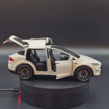 Load and play video in Gallery viewer, Explorafind 2020 Tesla Model X Off White 1:24 Die Cast Car