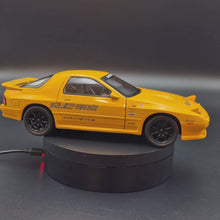 Load and play video in Gallery viewer, Explorafind 1989 Mazda RX-7 Yellow 1:24 Die Cast Car
