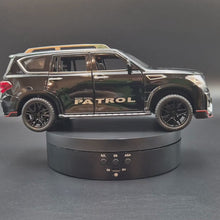 Load and play video in Gallery viewer, Explorafind 2023 Nissan Patrol Black 1:24 Die Cast Car