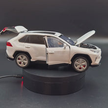 Load and play video in Gallery viewer, Explorafind 2023 Toyota RAV4 White 1:24 Die Cast Car
