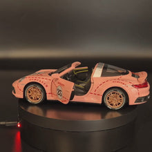 Load and play video in Gallery viewer, Explorafind 2021 Porsche 911 Targa 4S Pink 1:32 Die Cast Car
