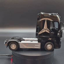 Load and play video in Gallery viewer, Explorafind 2023 Mercedes-Benz Actros 1851 Truck Black 1:24 Die Cast Truck