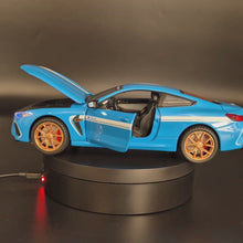Load and play video in Gallery viewer, Explorafind 2023 BMW M8 Manhart MH8 800 Blue 1:24 Die Cast Car