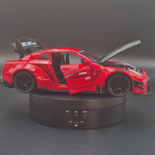 Load and play video in Gallery viewer, Explorafind 2020 Nissan GT-R Red 1:24 Die Cast Car
