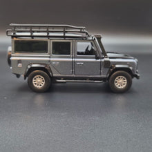 Load and play video in Gallery viewer, Explorafind 2012 Land Rover Defender Black 1:32 Die Cast Car
