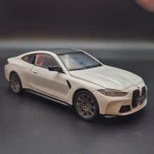 Load and play video in Gallery viewer, Explorafind 2023 BMW M4 G82 Coupe Pearl White 1:24 Die Cast Car
