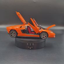 Load and play video in Gallery viewer, Explorafind 2023 Lamborghini Countach LPI 800-4 Orange 1:24 Die Cast Car
