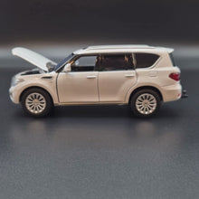 Load and play video in Gallery viewer, Explorafind 2023 Nissan Patrol Y62 White 1:32 Die Cast Car
