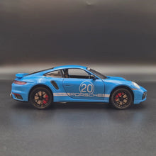 Load and play video in Gallery viewer, Explorafind 2021 Porsche 911 Turbo S Sky Blue 1:24 Die Cast Car
